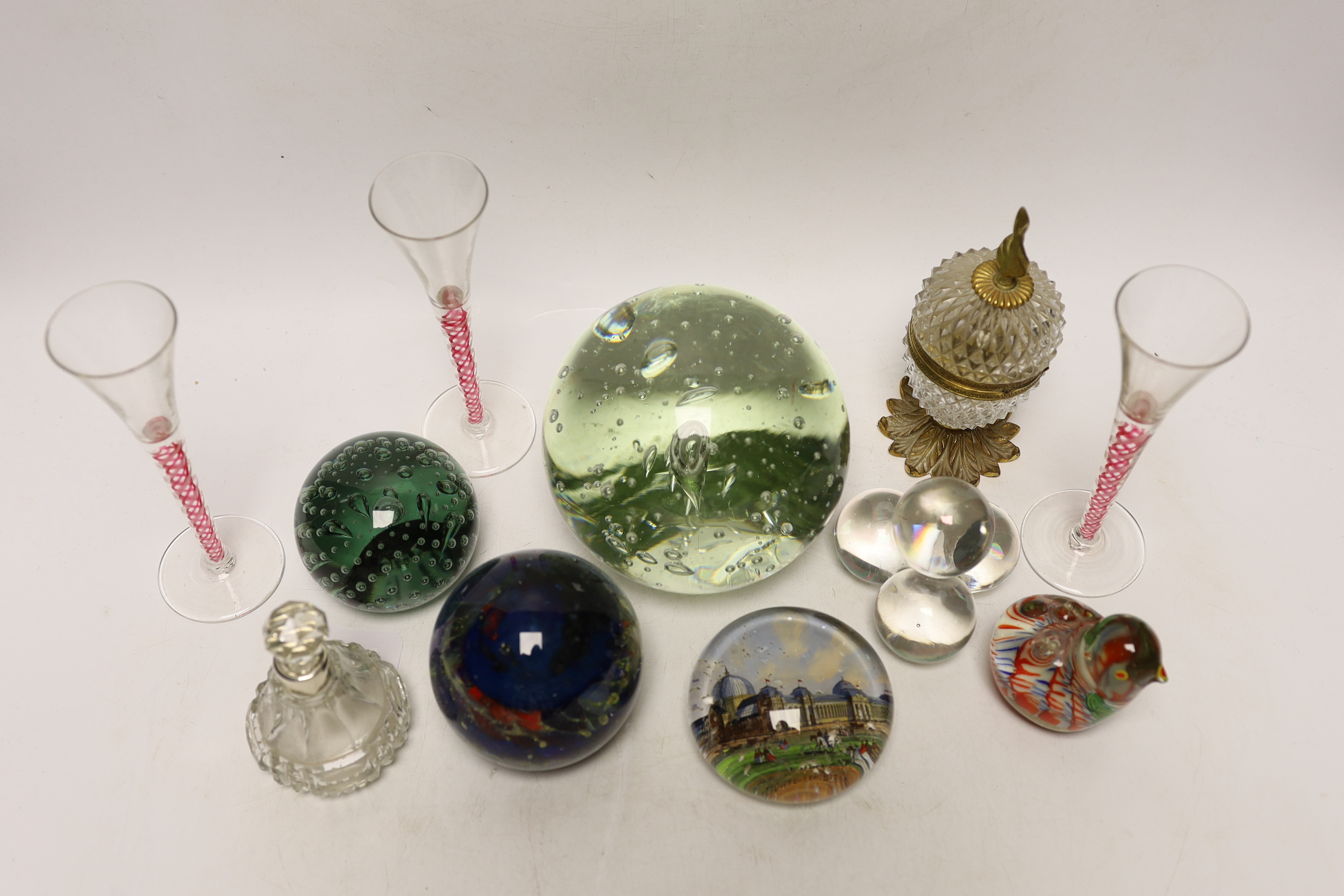 A glass dump, four paperweights, three airtwist glasses, 15cm, a scent bottle and an ink stand